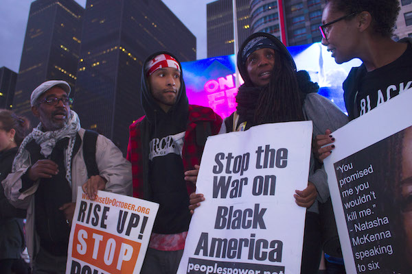 Protests Annoying? Murder Is Infuriating, Say #RiseUpOctober Participants 1 People of color said that marching allows them to convey how law enforcement targets them without accountability. Photo by Zach Williams.