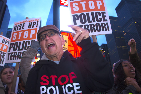 Protests Annoying? Murder Is Infuriating, Say #RiseUpOctober Participants 8 Activists rallied at Times Square as dozens of police looked on following the main march through the West Side. Photo by Zach Williams.