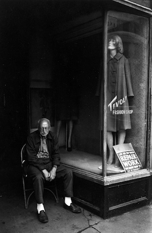  “Tivoli Fashion Shop” (1973) jumps at the viewer, with the man’s dejected look a sharp contrast to the snooty attitude of the mannequin. Courtesy Steven Kasher Gallery, New York.