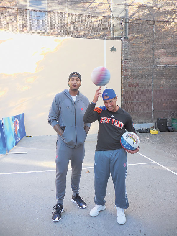 Knicks in major assist at W. Fourth St. courts 3 Melo doesn’t look too impressed with spin-meister Black Jack mugging for the cameras. PHOTO BY SHARON WOOLUMS