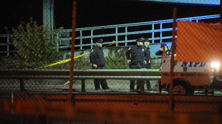 Police investigate after NYPD Officer Randolph Holder, 33, of Brooklyn was shot in the head during a foot pursuit in East Harlem on Tuesday, Oct. 20, 2015. Holder was pronounced dead late that night at a Harlem hospital, NYPD Commissioner William Bratton said early Wednesday, Oct. 21, 2015.