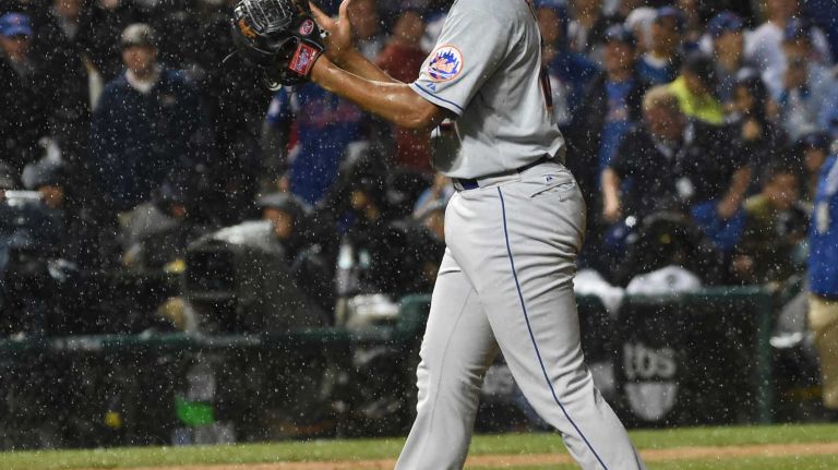 NLCS Game 3: Mets vs. Cubs 37 New York Mets relief pitcher Jeurys Familia (27) reacts after the final out in the ninth inning during Game 3 of the NLCS against the Chicago Cubs at Wrigley Field on Tuesday, Oct. 20, 2015.