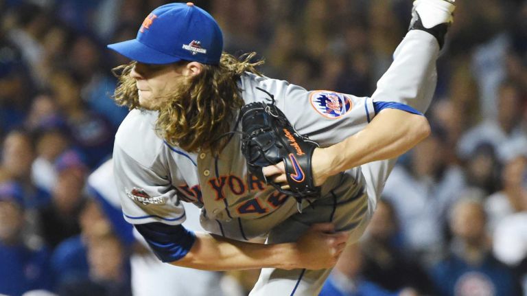 NLCS Game 3: Mets vs. Cubs 55 New York Mets starting pitcher Jacob deGrom (48) delivers the pitch in the second inning during Game 3 of the NLCS against the Chicago Cubs at Wrigley Field on Tuesday, Oct. 20, 2015.