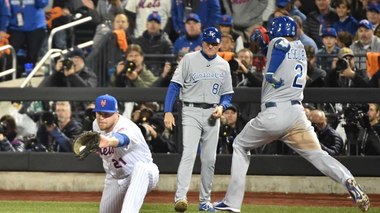 New York Mets first baseman Lucas Duda makes a play as he gets Kansas City Royals shortstop Alcides Escobar in the third inning during Game 4 of the World Series against the Kansas City Royals at Citi Field on Saturday, Oct. 31, 2015.
