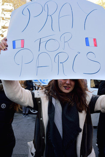 Uptown and Down, Manhattan Stands With Paris 5 A sign of spiritual solidarity with Paris at Washington Square Park. DONNA ACETO