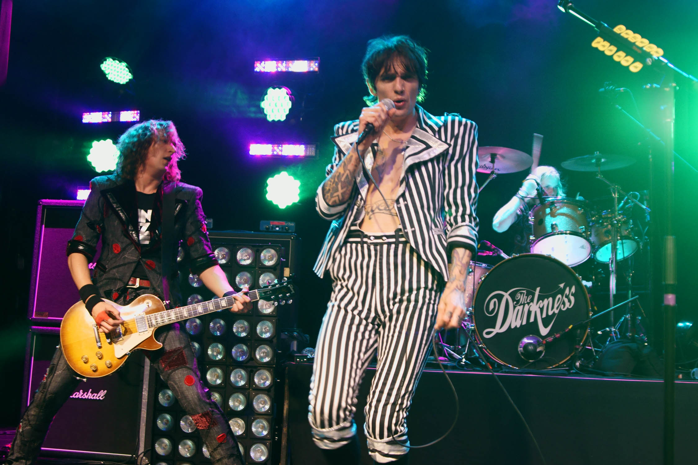 The brothers Hawkins, guitarist Dan, left, and singer Justin, packed a punch at the Gramercy show.