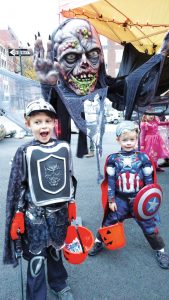 Photo compliments of Amanda Byron Zink Halloween heroes Kolten and Calvin Zink protect their neighborhood from a scary zombie.