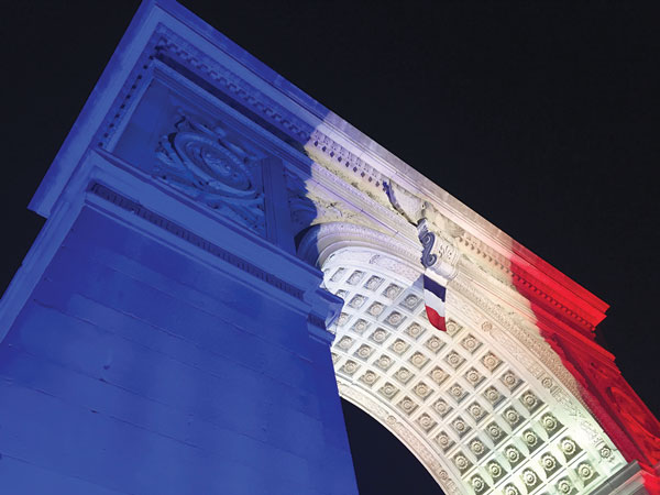 French vigil in Wash. Square, again, after night of horror 9 Photo by Tequila Minsky The Washington Square Arch was lit in the colors of the French flag on Saturday evening.