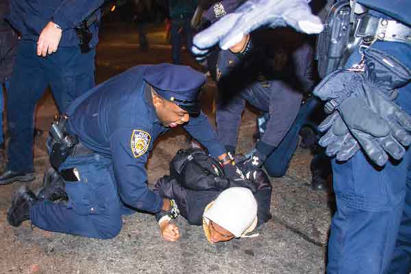 A protester was arrested during the four-hour action, which saw marchers use more charged rhetoric than at some previous events.