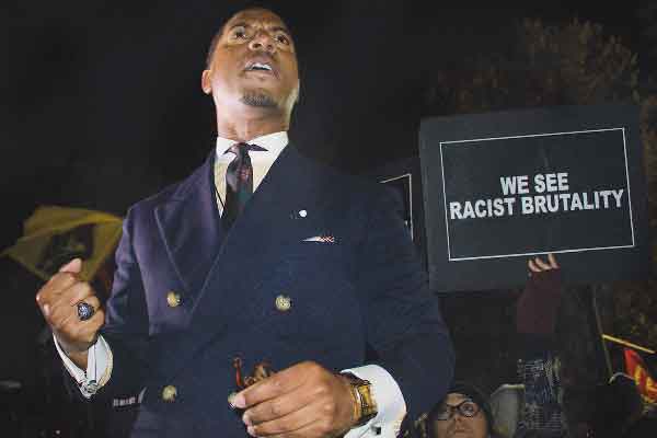 Photos by Zach Williams Preacher Robert Price told the marchers, “We’re worried about what’s going on — that black lives still don’t matter.”