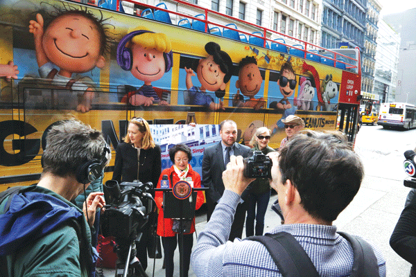 Photo courtesy of Councilmember Margaret Chin’s office At a press conference in October announcing a bill that would cap the number of tour buses, the ubiquitous double deckers made several guest appearances in the background.