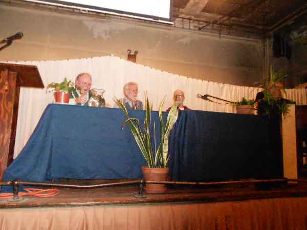 Photo by Mary Reinholz Speaking at Maryhouse last week, ’65 draft-card burners, from left, Jim Wilson, Tom Cornell and Dave McReynolds.