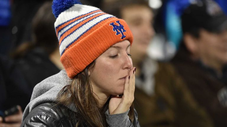World Series Game 5: Mets vs. Royals 105 New York Mets fans react in the 12th inning during Game 5 of the World Series against the Kansas City Royals at Citi Field on Sunday, Nov. 1, 2015.