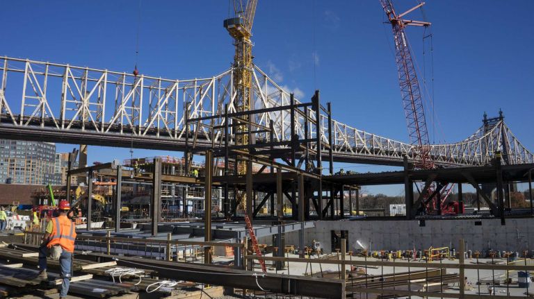 A floating ramp is seen south of the Ed Koch Bridge on Roosevelt Island (East Side), Tuesday, Nov. 17, 2105, a key component of the Cornell Tech construction project, where trucks arriving to the site by barge greatly reduce truck traffic on the island. Development of the first phase of the campus is currently underway and due to open in 2017. A tour of the project included views of steel and other materials rising for each building as part of phase one, The Bloomberg Center, named in honor of Emma and Georgina Bloomberg, The Bridge (center), where companies will locate on campus, and a residential building (left) for faculty, staff and students, which will be the first Passive House residential high-rise in the world.