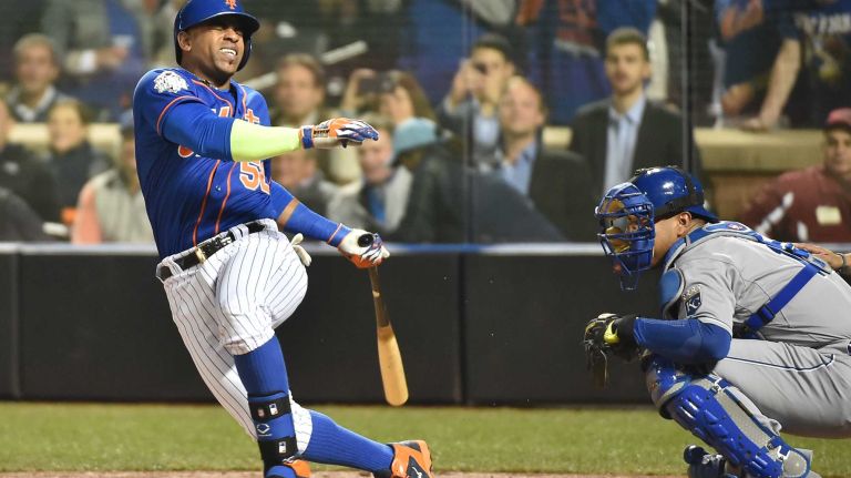 World Series Game 5: Mets vs. Royals 144 New York Mets centerfielder Yoenis Cespedes (52) reacts after fouling the ball off his knee in the sixth inning during Game 5 of the World Series against the Kansas City Royals at Citi Field on Sunday, Nov. 1, 2015.