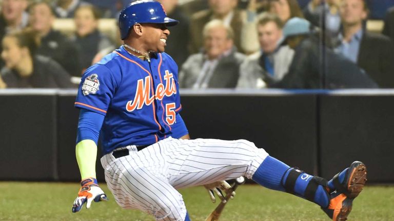 World Series Game 5: Mets vs. Royals 145 New York Mets centerfielder Yoenis Cespedes falls after fouling the ball off his knee in the sixth inning during Game 5 of the World Series against the Kansas City Royals at Citi Field on Sunday, Nov. 1, 2015.