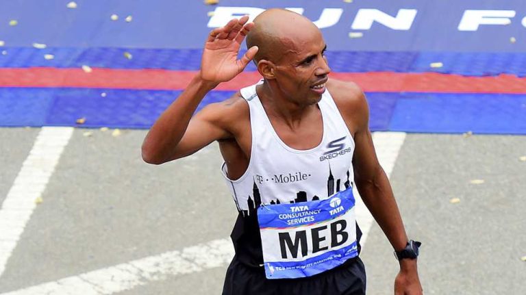 Meb Keflezighi of the United States finishes seventh as the first American runner to finish this year's Men's New York City Marathon in Manhattan on Sunday, Nov. 1, 2015.
