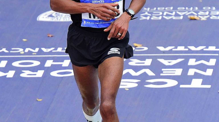 Meb Keflezighi of the United States finishes seventh as the first American runner to finish this year's Men's New York City Marathon in Manhattan on Sunday, Nov. 1, 2015.