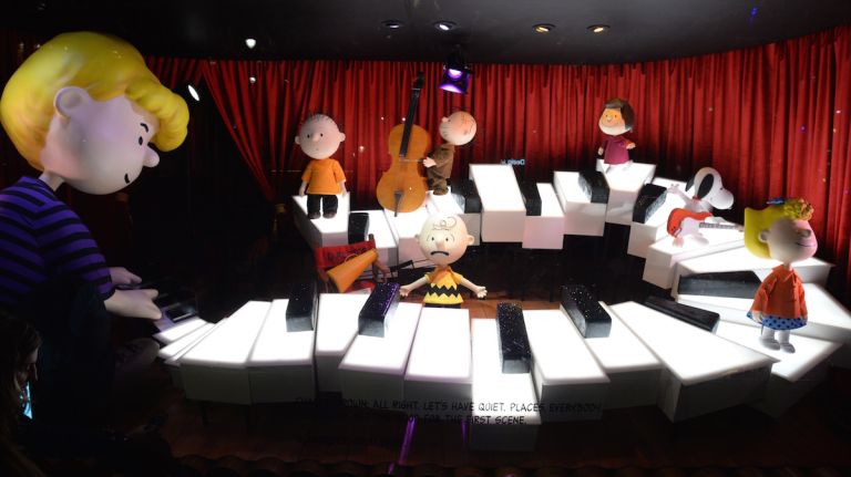 At rehearsal, the actors enjoy Schroeder's piano playing while director Charlie Brown struggles to enforce his authority. Onlookers can try their hand at the piano with the interactive keys that reveal music notes to the song, 