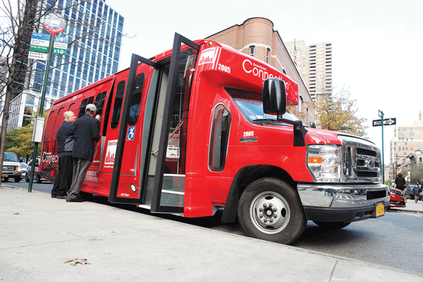 All aboard! 1 Downtown Express photo by Milo Hess The Downtown Alliance unveiled its snazzy new shuttle buses over the weekend.