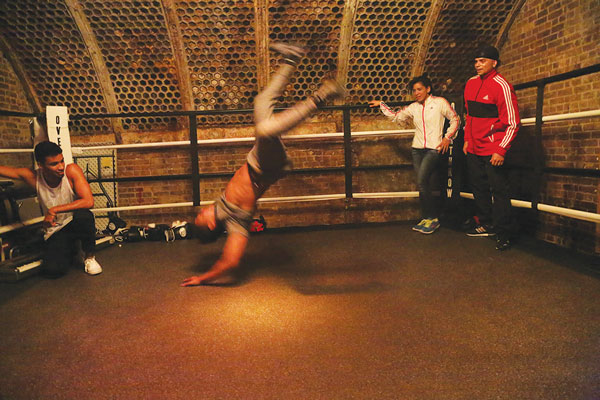 Photos by Clayton Patterson Throwing down moves in a breakdancing competition at Overthrow, in the former Yippies building, at 9 Bleecker St.