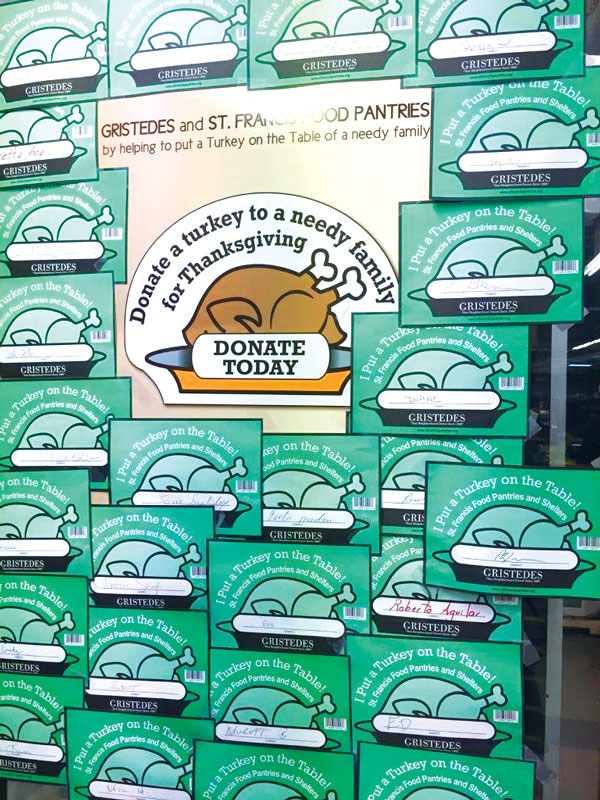 Donations to the St. Francis Food Pantries and Shelters turkey drive are acknowledged with cards posted on the walls of Gristedes supermarkets.