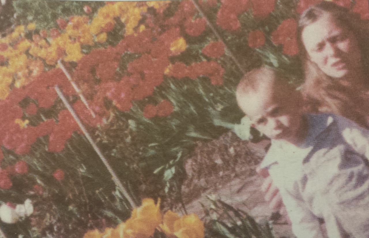 Anne a.k.a. Eve No. 2 with Adam David, her son with Adam Purple, in the garden in 1982.