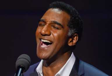 DEC.20-Norm-Lewis-by-Kevin-Yatarola-IS