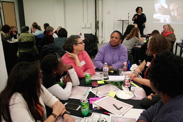Women’s Building Envisioned as ‘Vertical Neighborhood’ 1 An artist used images to record the conversation at the meeting, while activist Maura Bairley (background, center) moderated the discussion. Photo by Yannic Rack.