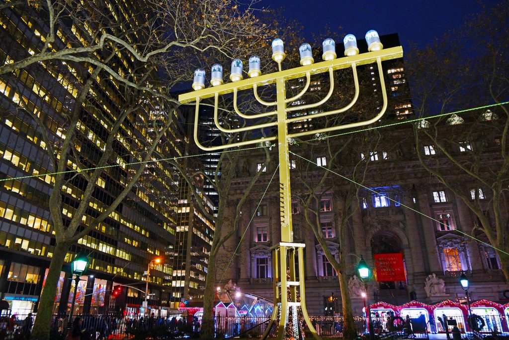 Photo by Milo Hess Downtown celebrates Chanukah with a nightly menorah lighting at Bowling Green.