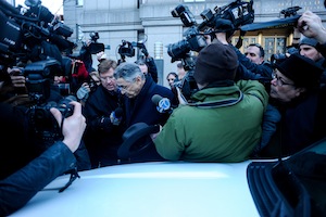 File photo by J.B. Nicholas Silver was surrounded by a less-adoring crowd as he left Downtown’s Federal Court Building after his arraignment on federal corruption charges in January.