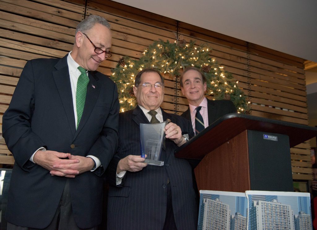 Gateway gala fetes Nadler 1 Congressman Jerrold Nadler, center, holding his award from the Gateway Plaza Tenants Association, flanked by association president Glenn Plaskin on the right and Sen. Charles Schumer on the left, at the G.P.T.A. holiday party on Dec. 6.