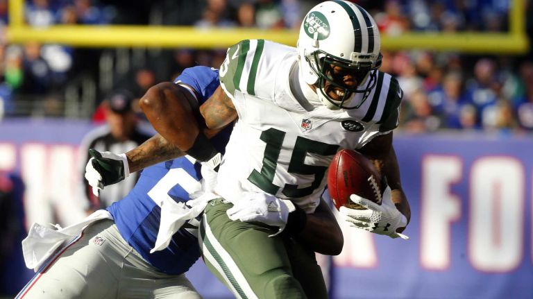 Brandon Marshall #15 of the New York Jets runs the ball after a reception in the first half against the New York Giants at MetLife Stadium on Sunday, Dec. 6, 2015 in East Rutherford, N.J.
