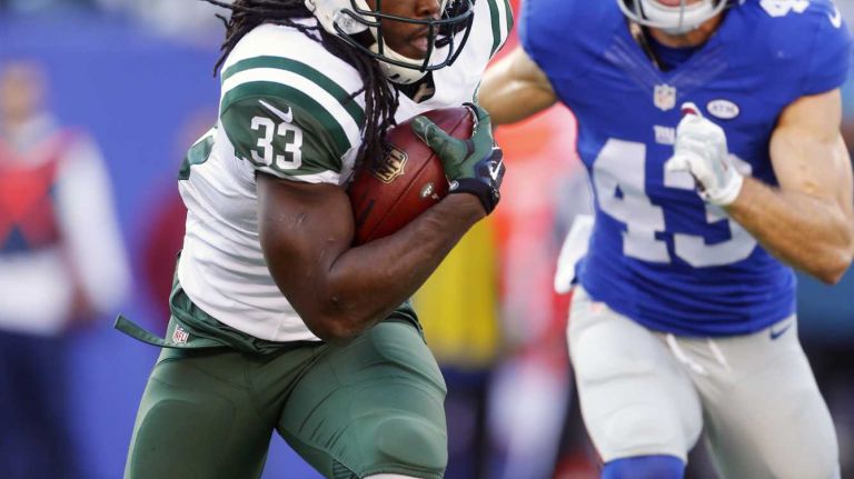Chris Ivory #33 of the New York Jets runs the ball in the first half against the New York Giants at MetLife Stadium on Sunday, Dec. 6, 2015 in East Rutherford, N.J.