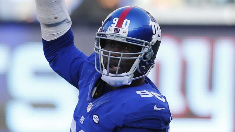 Jason Pierre-Paul #90 of the New York Giants looks on against the New York Jets at MetLife Stadium on Sunday, Dec. 6, 2015 in East Rutherford, N.J.