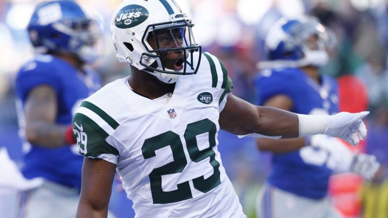 Bilal Powell #29 of the New York Jets celebrates after he caught a touchdown pass against the New York Giants at MetLife Stadium on Dec. 6, 2015 in East Rutherford, N.J.