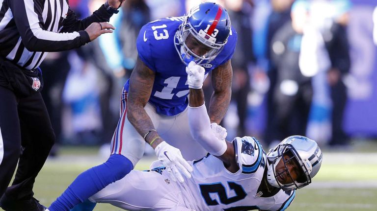 Odell Beckham Jr. vs. Josh Norman 24 Josh Norman #24 of the Carolina Panthers mixes it up with Odell Beckham #13 of the New York Giants after a play in the first half at MetLife Stadium on Sunday, Dec. 20, 2015 in East Rutherford, New Jersey.
