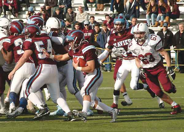 Photo by Arthur De Gaeta Running back Michael Chiarovano and Xavier High School’s offense ground out the hard yards against Fordham Prep in the championship game.