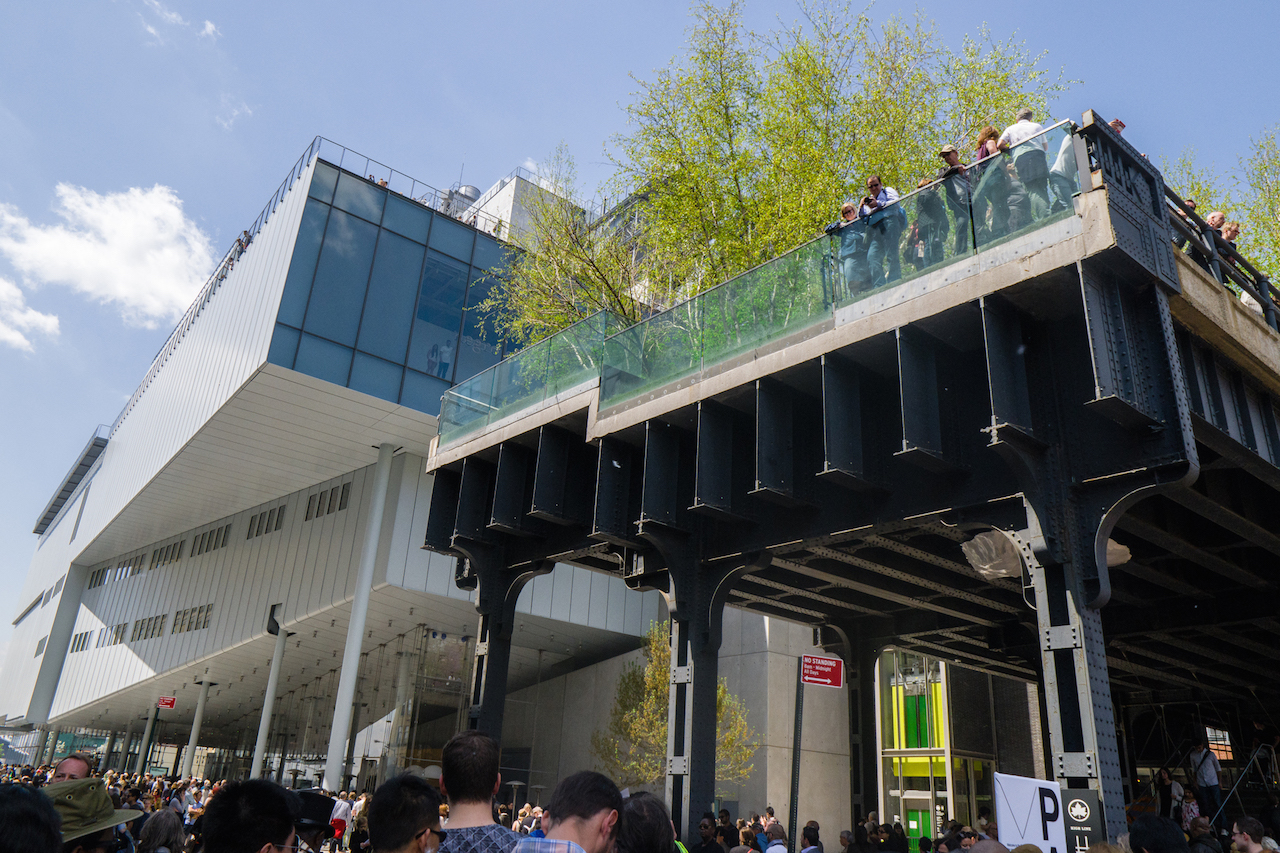 The Whitney Museum of American Art — seen with the High Line park in the foreground — drew crowds on its opening weekend in May, above. Architect Renzo Piano has described the new building’s design as defying gravity. File photo by Milo Hess