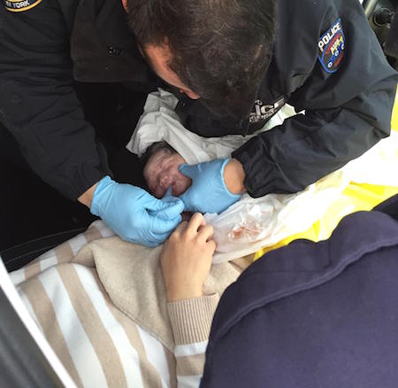 A Highway Miracle 2 Nicola Wong with his EMT-trained NYPD helpers. | NYPD DCPI