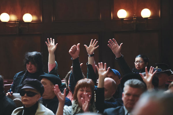 Confusion Reigns at City Council Carriage Hearing 3 The audience resorted to wiggling their hands, after one of the council’s sergeants-at-arms warned that he would kick out those that cheered — or heckled — during the hearing. Photo by William Alatriste/NYC City Council.