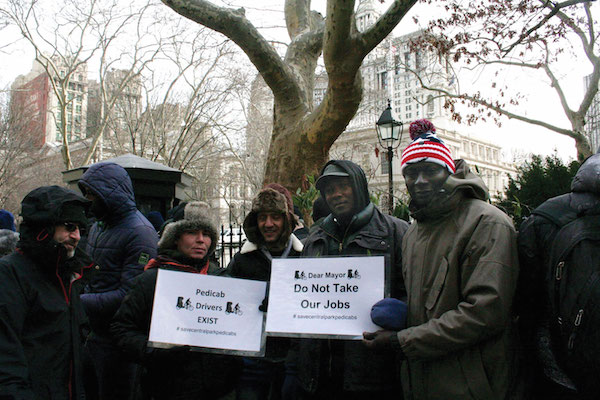 Confusion Reigns at City Council Carriage Hearing 2 Pedicab operators queued outside City Hall on Friday to testify against a bill that would ban them from most of Central Park. Photo by Yannic Rack.