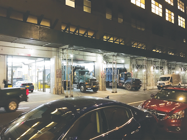 Google Neighbor Searching for Some Peace 4 A view of the nighttime work and trucks at the Google Building’s loading docks, located across from 305 W. 16th St.
