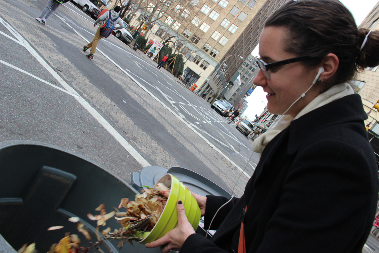 Composting comes to Spring St., twice a week 2 Dumping vegetable scraps at Spring St. and Sixth Ave. at the composting drop-off spot. Photos by Tequila Minsky