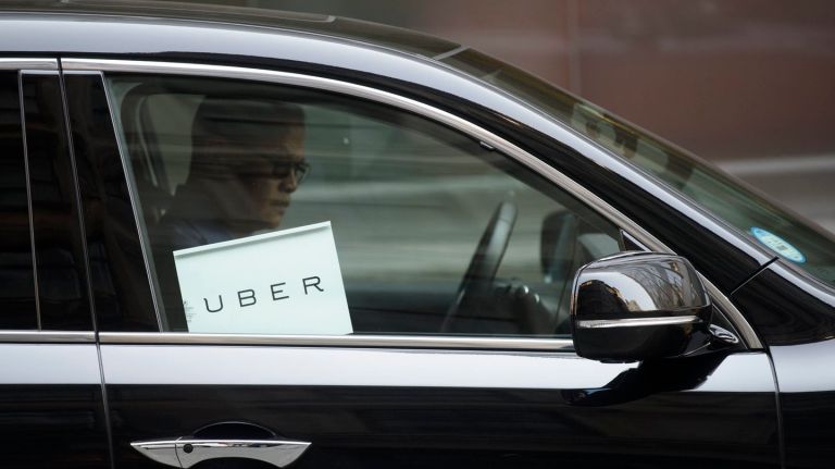 Uber and state AG agree to rider data encryption deal 2 An Uber car idles after dropping off a passenger in lower Manhattan on July 16, 2015.