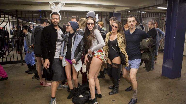 Participants in the No Pants Subway Ride pose while they wait for a train in their underwear in New York on Jan. 10, 2016.