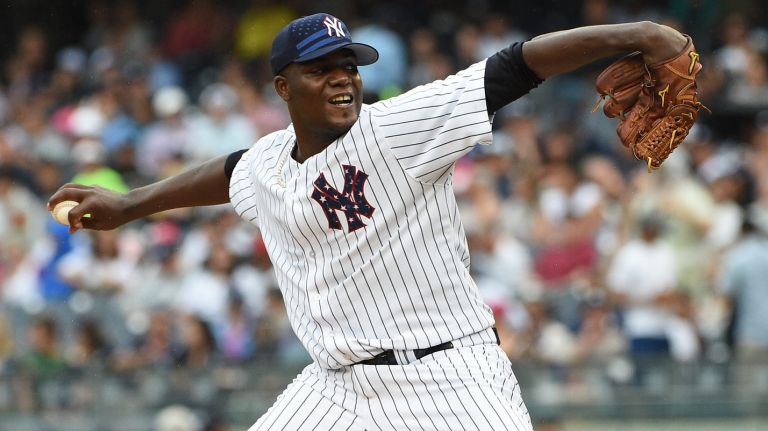 
New York Yankees starting pitcher Michael Pineda delivers a pitch against the Tampa Bay Rays during the first inning of a game at Yankee Stadium on Saturday, July 4, 2015.