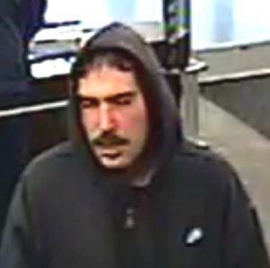 Police say this man robed two banks by passing notes to the tellers, netting $1,214.