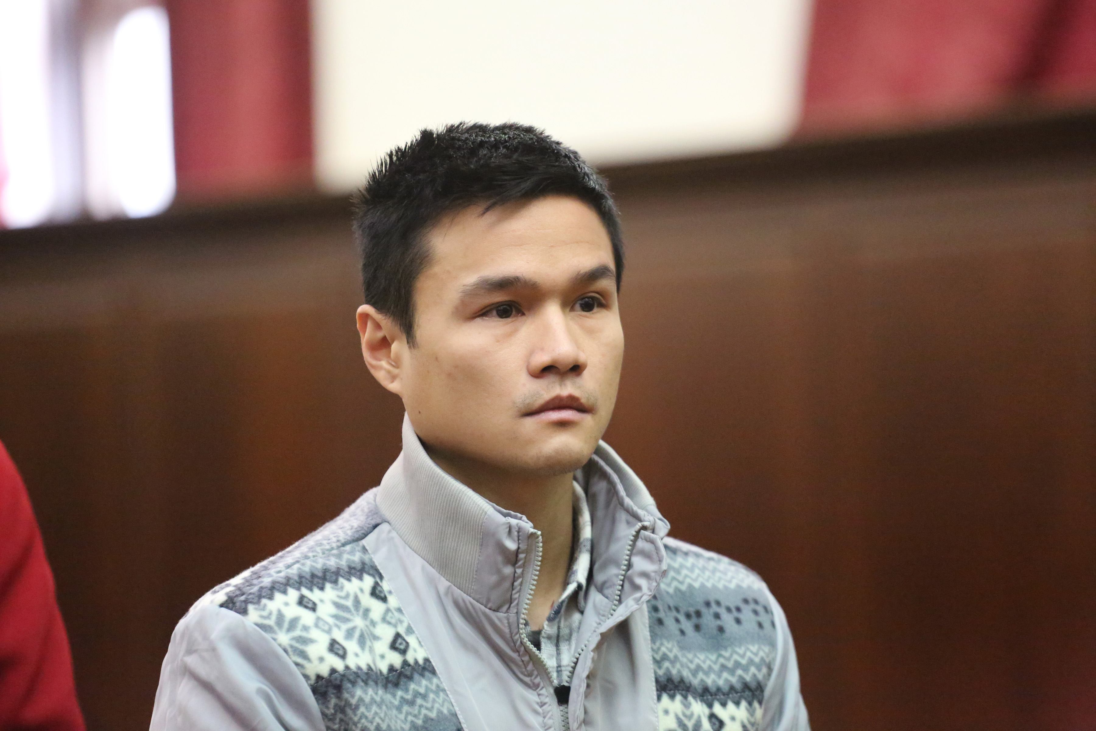 Francis Salud, 28, appearing at his arraignment in Manhattan Criminal Court on Fri., Jan. 22. Salud is accused of a random slashing in the East Village on Sat., Jan 16, that left a man needing 150 stitches to close a gash on the side of his face. Photo by Jefferson Siegel