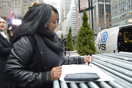 Beyoncé’s Friends Greatly Outnumber Detractors at Post-Super Bowl Face-Off 3 Black Girl Rising! organizer Mela Machinko draws up her counter-protest sign that would read: "Where Y'all At?" | JACKSON CHEN